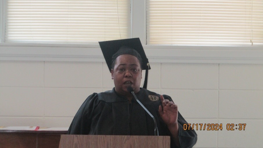 A person behind the podium speaking.